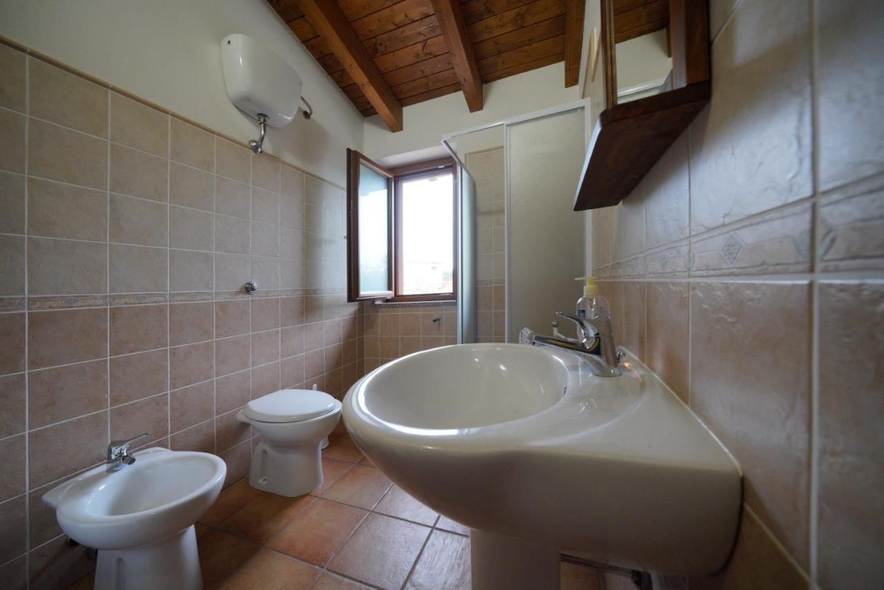 Apartamento L'Oliveto Nuxis Exterior foto